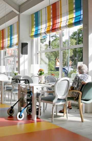 lonely senior in cafe of elderly house